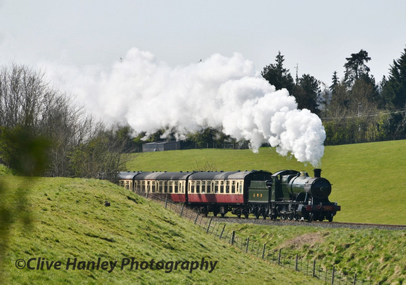Churchward 2-8-0 Heavy Goods Loco no 2857 climbs the bank withy the 9.15am from Kidderminster