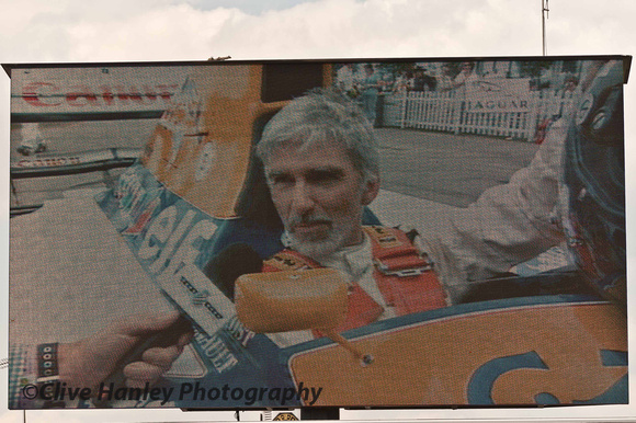 Damon Hill, wearing his Santa Claus beard, was interviewed after his run up the hill.