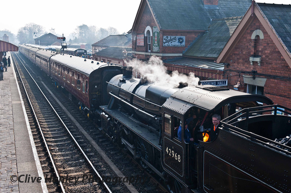 It's good to be close to a roaring fire on a cold day. THIS wasn't a cold day. 42968 arrives at Bewdley.