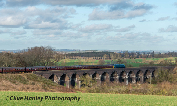 Next train over the viaduct was headed by Class 37 no 37215 (D6915)