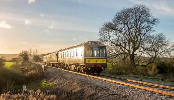 The DMU climbs up Defford straight with the 14.30 ex Cheltenham