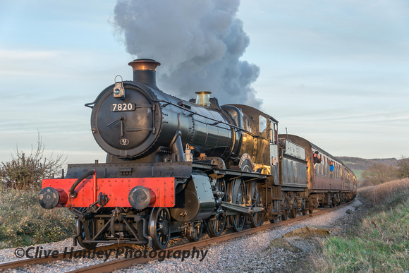 7820 Dinmore Manor passes in the late afternoon sunshine.
