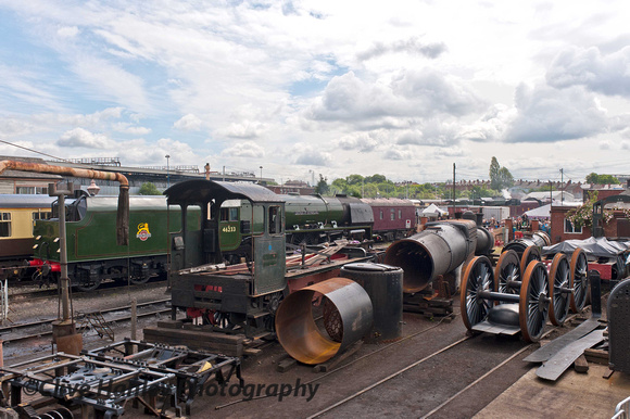 46233 hides amongst the various loco parts at Tyseley.