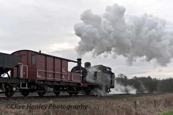 Jinty 0-6-0 shunter no 47324 (as 47584) banks the freight past Burrs.