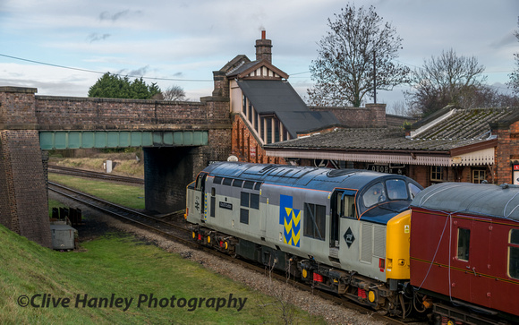 37714. The train was so long the loco had to pass under the bridge before stopping to ensure passengers could exit all carriages.