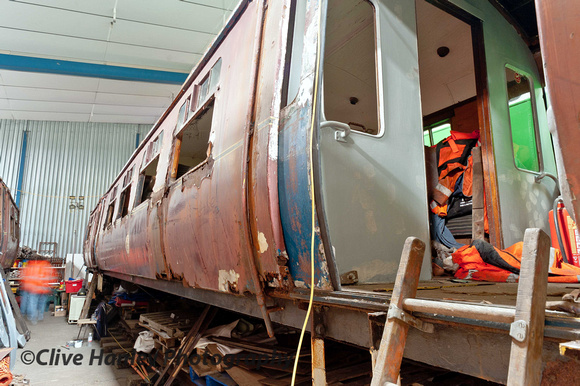 The 2-car Class 502 is finally under cover after over 10 years outside rotting away.