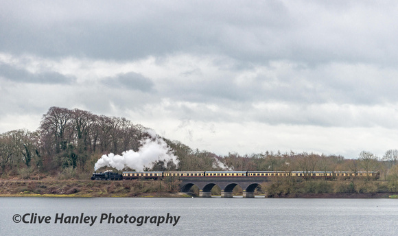 78018 is passing over the first of the two viaducts at Swithland reservoir.