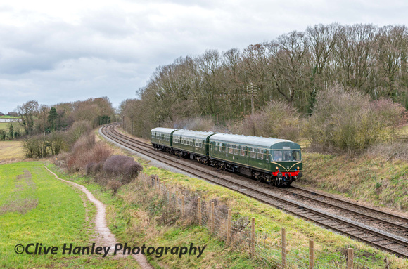 The DMU heads south and was passing Kinchley lane bridge.