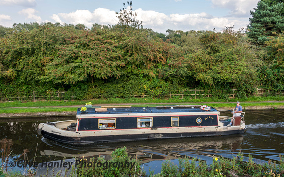A passing barge on the canal at the northernmost part of the GCR.
