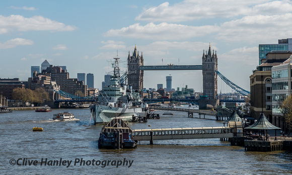 Tower Bridge is the background to the WWII Cruiser HMS Belfast.