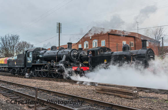 Ivatt 2 no 46521 reverses out of the sidings towards the shed and passes 47406