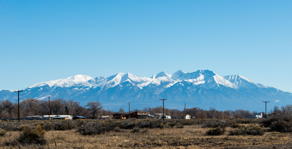 A view towards some nearby snow capped peaks.