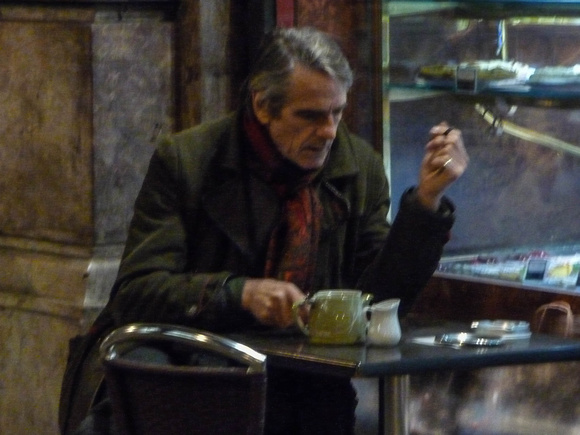 On Piccadilly taking tea while smoking a small cigar was Jeremy Irons.