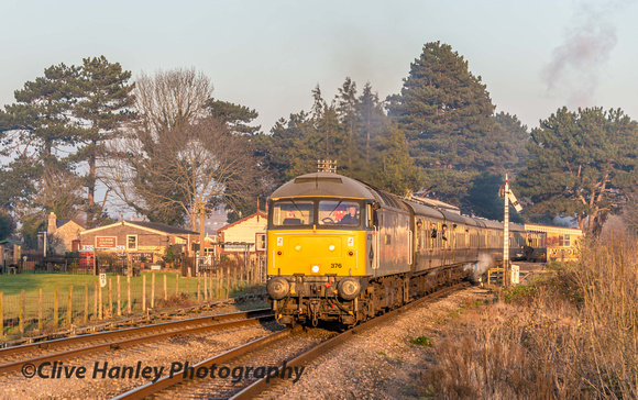 Heading directly into the low sunshine is 47376 as it departs Gotherington bound for Cheltenham.