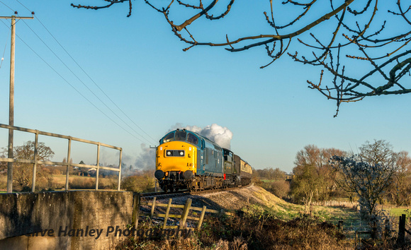 After a move to Didbrook bridge 37215 approaches with 2807 as train locomotive.