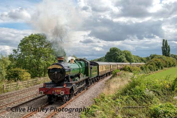 GWR Hall Class 4-6-0 no 4965 Rood Ashton Hall rounds the curve at Hatton North Junction with the lunchtime Shakespeare Express.