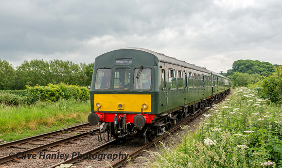 The DMU heads past with the 12noon from Rothley.