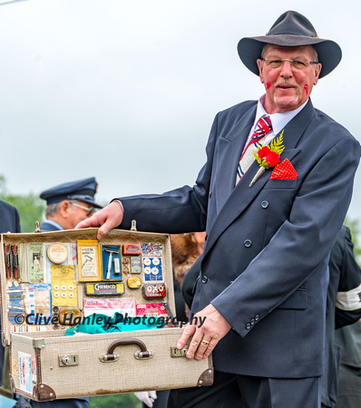 A spiv with his black market wares.