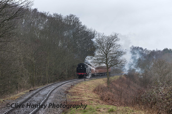 80072 drops down from Kelling Heath station towards Weybourne.