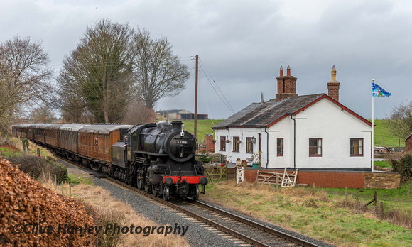 43106 drifts past the Crossing Keepers cottage hauling the 12 noon train from Bridgnorth