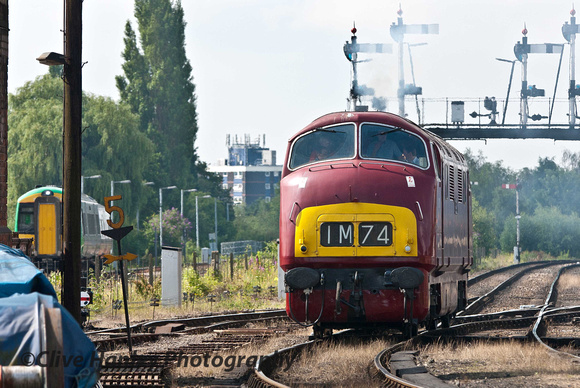 D821 exits the diesel depot - its rear wheels are still on the crossing track.
