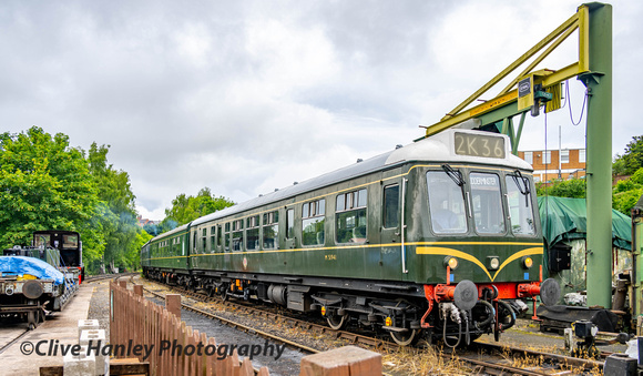 The DMU from Shrewsbury awaits the signals to proceed.