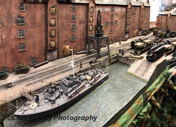 A wartime scene at the docks.