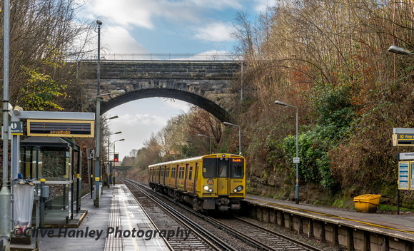 Unit 507013 arrives at Aughton Park station from Liverpool.