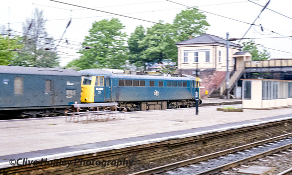 Class 85 no 85020 races north through Leyland. Panning a fast moving train was not easy!