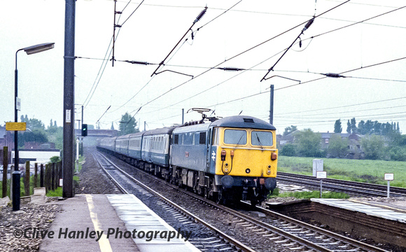 Leyland station with a Class 87 hauling a 100mph express.