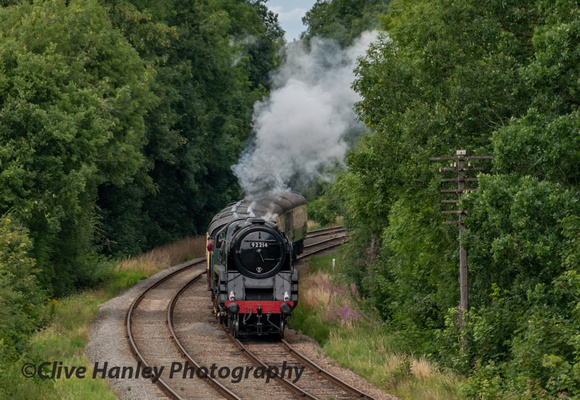 92214 rounds the curve on the approach to Kinchley lane bridge.