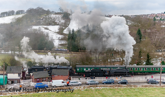 Looking down onto Cheddleton station with 45231 and 5197.