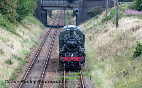 Ivatt Mogul no 46521 wheezes and hisses as it's propelled to Quorn station for display.