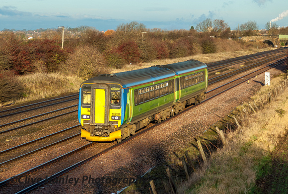 Unit 156404 heads south on the slow line at Cossington.