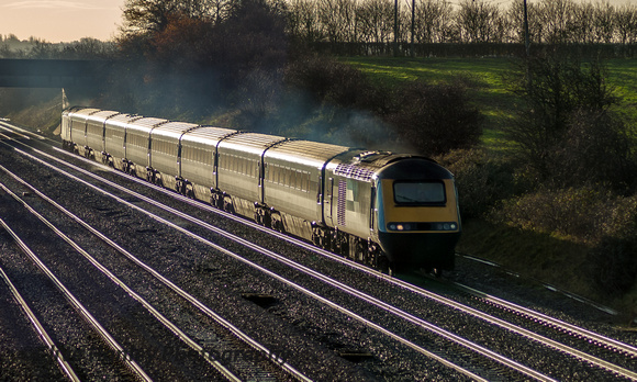 A Midland Mainline HST heads north approaching Cossington road bridge.