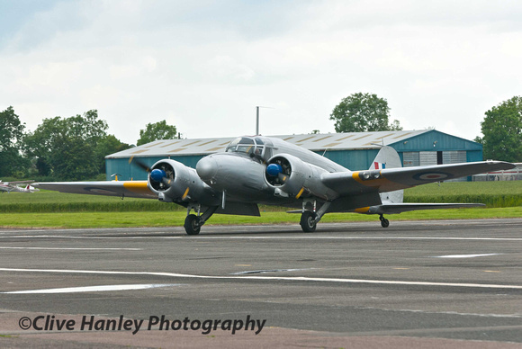 11.07am. The Anson moves off the runway towards its display area.