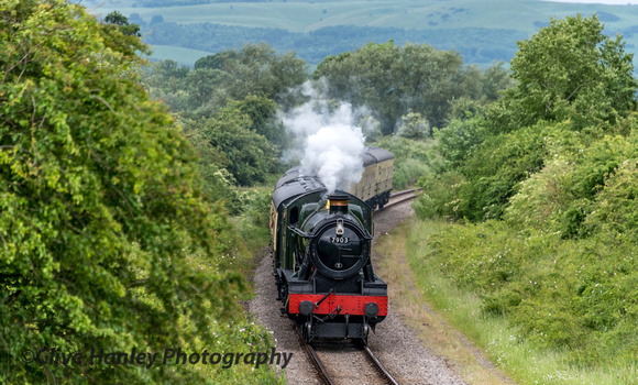 GWR Hall Class 4-6-0 no 7903 Foremarke Hall approaches Hayles Abbey bridge with the 9.20 to Broadway