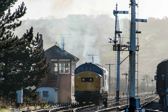 A Class 37 loco was approaching the station to couple onto 7903.