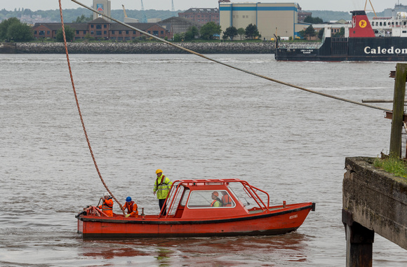 The Kestral was being used to manage the ropes for securely mooring the ship.
