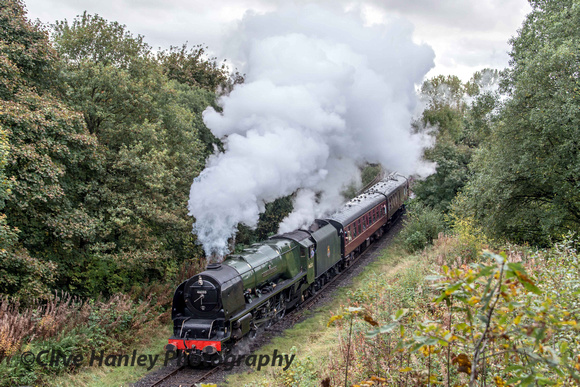 46233 Duchess of Sutherland storms up the grade towards the tunnel mouth to the north of Summerseat.