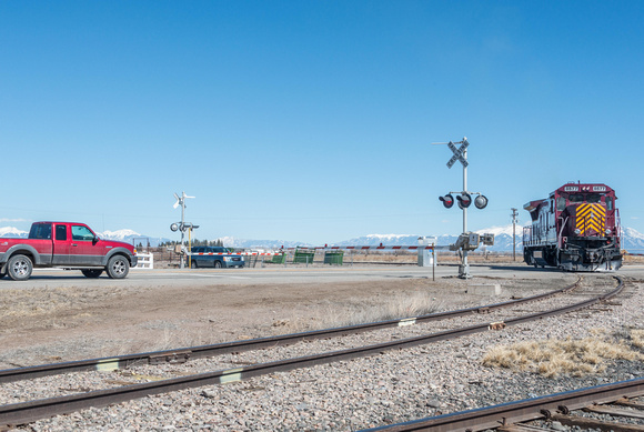 The barriers were down and the horn was blaring as it reversed towards the sidings and the connection with the San Luis Central.