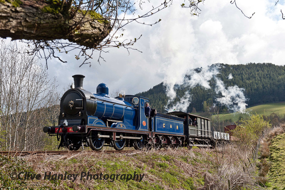 The Caledonian Railway 0-6-0 no 57566 (as 828) approaches Deeside Halt with a short freight.