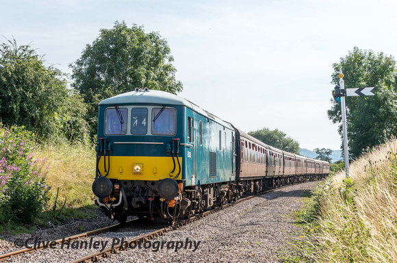 Class 73 electro-diesel no E6036 approaches Hayles Abbey.