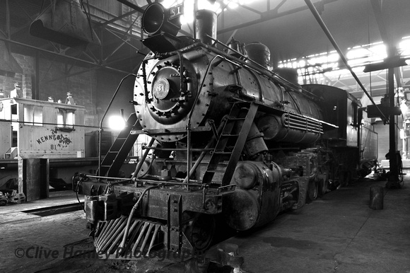 A third steam loco stands unrestored in the shed at East Ely