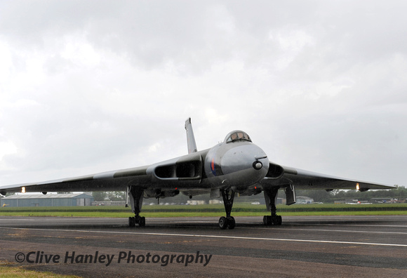 11.33am. With the rain falling XM655 returns.