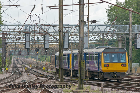 Unit 142004 heads south with the 15.50 service from Blackpool North to Manchester Victoria.