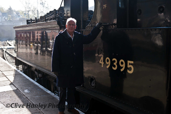 Music impresario and railway enthusiast Pete Waterman poses for me alongside the G2 0-8-0 no 49395 that he financially supported for its major overhaul.